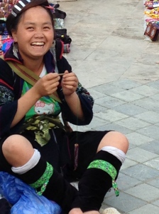 Hmong woman selling goods in Sapa
