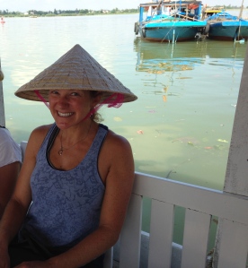 My borrowed hat for the ferry ride to the market in Hoi An.