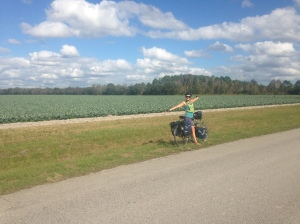 My bicycle and I in a field of kale.