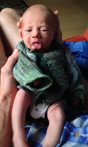 Ruby's first hand knit sweater.  Thanks Aunt Sue!